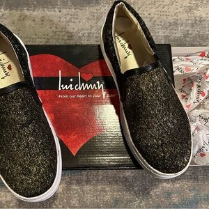 New women's size 8 Luichiny Black and Gold Flats